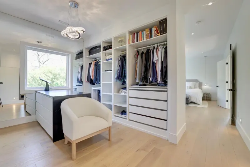 Riverview walk-in closet with custom storage